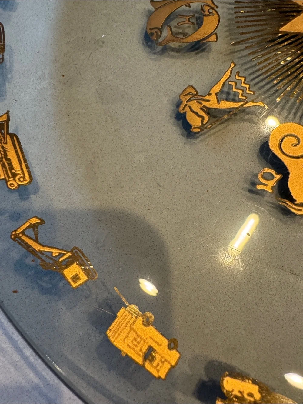 Glass Decorative Plate with Gold Zodiac Accents and heavy equipment